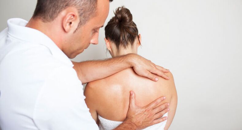 back examination and massage by a specialist